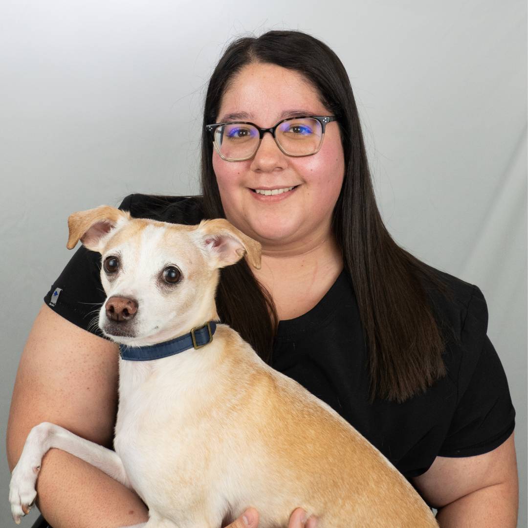 Amanda holding small dog